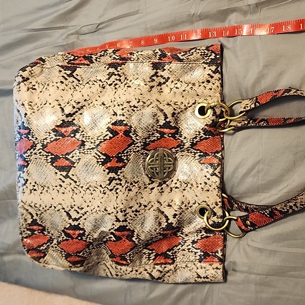 Kate Landry snakeskin orange and metallic purse.